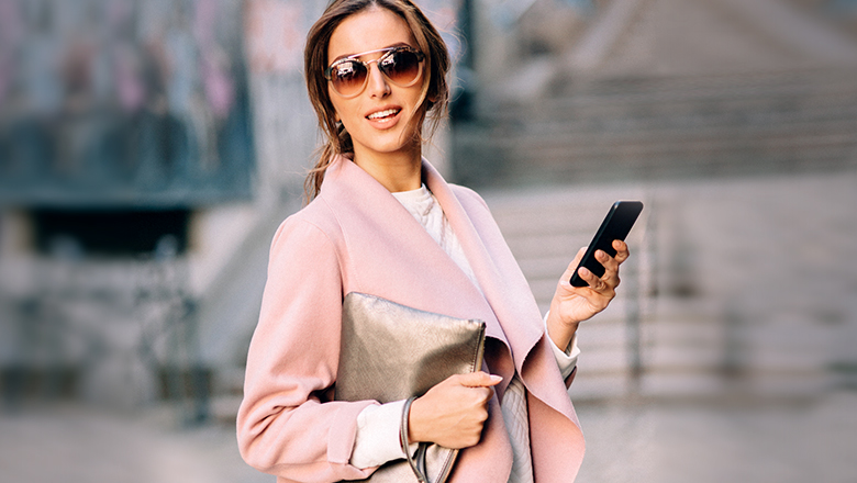 woman using app on her phone